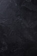 Natural black stone background pattern with high resolution. Top view. Copy space.