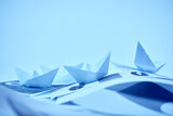 Fototapeta Big Ben - business concept, paper boats on the documents