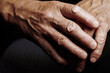 © Westend61 - Hands of senior man with wrinkled skin