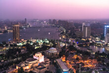 Egypt, Cairo, View Of Gezira Island At Dusk With Cairo Opera House In Foreground And River Nile In Background