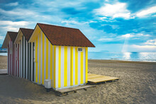 A Changing Booth On The Beach Of The Sea Coast. High Quality Photo