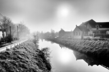 Foggy Morning On The Canal Of The Loing River In Moret-Loing-et-Orvanne Village. French Gatinais Regional Nature Park