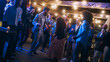 © Gorodenkoff - Beautiful Carefree Friends are Dancing Together and Celebrating an Evening Event at a Party . Diverse Multiethnic Young Adult People Have Fun at a Corporate Party in a Restaurant.