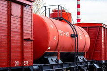 Red Retro Train Cistern Wagon For Petroleum And Oil Delivery By Railway Transport.