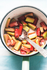 Rhubarb cut with sugar in pot