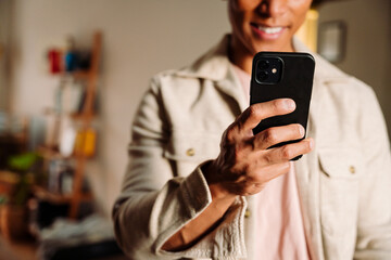 Young Male Asian on cellphone 