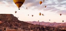Panoramic View Of Hot Air Balloons Flying During Festival In Cappadocia, Turkey