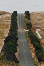 A Steep Road Between Farming Land
