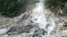 Rising Steam From Sulphur Springs In Saint Lucia. Drone Footage Of Soufriere's Fumaroles, In The World's Only Drive-in Volcano.