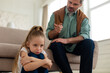 © Prostock-studio - Strict Father Scolding Sad Little Daughter Sitting At Home