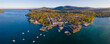 Bar Harbor historic town center panorama aerial view at sunset, with Cadillac Mountain in Acadia National Park at the background, Bar Harbor, Maine ME, USA. 