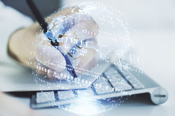 Poster - Double exposure of abstract programming language with world map and hand writing in notebook on background with laptop, research and development concept