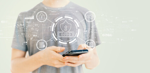 Wall Mural - Cyber security theme with young man using a smartphone