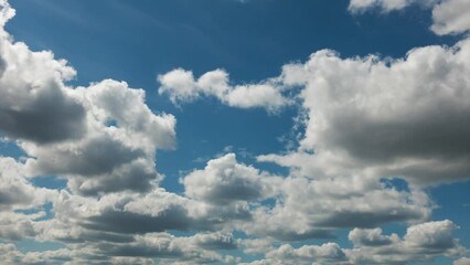 Wall Mural - Time lapse of majestic sky, clouds quickly fly from left to right.