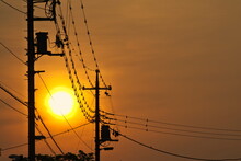 Tokyo,Japan - May 20, 2022: Silhouette Of Utility Poles And Wire At The Sunrise 
