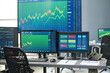 © pressmaster - Horizontal no people shot of stock and currency trading agents workspace with desktop computers and various monitors in modern office interior
