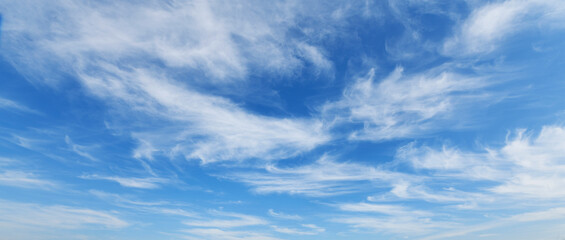 Wall Mural - white clouds against blue sky background