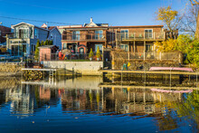 View On The Houses Built Near The Lachine Canal In Montreal (Quebec, Canada) With Their Reflection In The Calm Waters On A Clear Fall Day