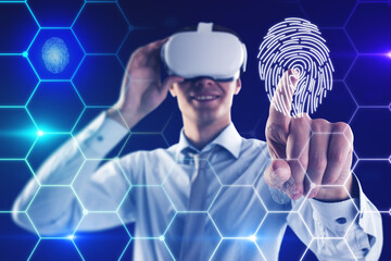 Poster - Attractive young european man with VR glasses on blue background with digital thumb print biometrics hexagonal hologram. Virtual reality, access and experience concept. Double exposure.