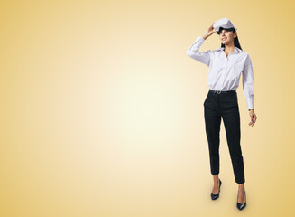 Fototapete - Virtual reality concept with stands at full length young woman looking up and white VR headset on her head on abstract light orange background with place for your logo or text, mock up
