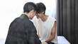 © Prathankarnpap - Romantic male lgbt couple sitting on bed while spending time together. LGBT and love concept
