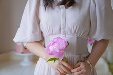 Girl And Pink Peony Flower