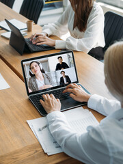 Wall Mural - Web conference. Virtual business event. Internet meeting. Diverse partners discussing international cooperation working online in digital office on laptop screen.