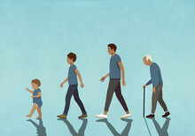 Multigenerational Males In Blue Walking In A Row
