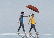Husband Holding Umbrella Over Pregnant Wife Walking In Rain
