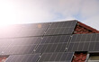 © Dragoș Asaftei - Energy from sun. A lot of solar panels are on the roof of a house. Photo during a sunny day with blue sky. Green eco friendly energy. Photovoltaic power supply industry.