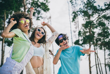 Portrait Of Positive Cheerful Three People Chilling Dancing Have Good Mood Forest Outdoors