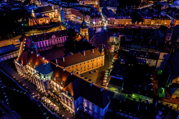 Wall Mural - Cityscape of old buildings and architecture in the old town in Warsaw. Aerial view of old buildings, castles and a church in the old city of Warsaw.