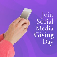 Social media giving day text by caucasian man using smartphone on purple background, copy space