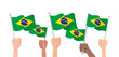 Hands with brazil flag isolated on white background. Vector stock
