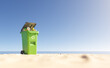 Trash bin on sandy beach