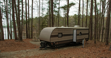 Canvas Print - Jordan lake behind a camping trailer