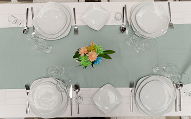 Glasses, fork, knife served for dinner in a restaurant