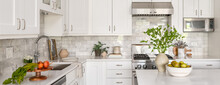 Style Home Still Lifestyle Image. Contemporary Kitchen Design With White Cabinets, Counters, And Backsplash. Interior Design Social Media Banner.