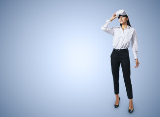 Aufkleber - Virtual reality concept with stands at full length young woman looking up and VR headset on her head on abstract light blue background with place for your logo or text, mock up