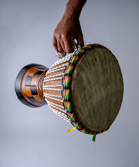 A women practicing Djembe, instrument shamanic 