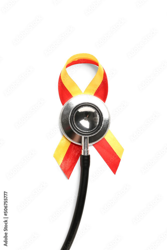 Awareness ribbon with stethoscope on white background. Hepatitis concept