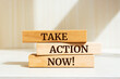 © Uuganbayar - Wooden blocks with words 'Take action now!'. Business concept.