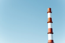 Tall Factory Chimney Without Smoke Against Clear Blue Sky On Sunny Day Outdoors, Copy Space