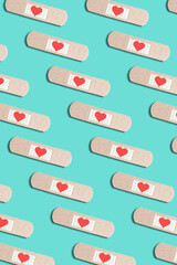 medical patch with red heart on blue background. abstract pattern love concept