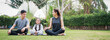 © chayantorn - Family Asian parent and child daughter preparing to play yoga together  at home garden.