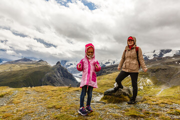 Canvas Print - tourist girls mother and daughter and mountain views