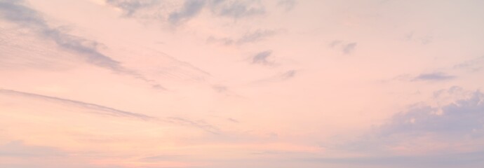 Wall Mural - Clear blue sky. glowing pink and golden cirrus and cumulus clouds after storm, soft sunlight. Dramatic sunset cloudscape. Meteorology, heaven, peace, graphic resources, picturesque panoramic scenery