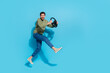 © deagreez - Full length photo of funky millnnial brunet guy run drive wear shirt jeans footwear isolated on blue background