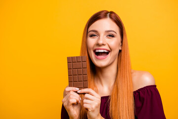 Sticker - Photo of pretty cute young lady dressed red clothes ready eating milk chocolate empty space isolated yellow color background