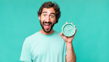 Young Adult Hispanic Crazy Man With An Alarm Clock